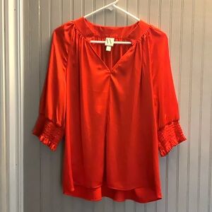 Elegant Red Women's Top. Size large.